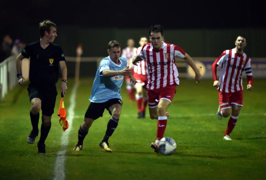 Jody Munro chases Jevan Anderson in an Aberdeenshire Shield game in 2018


Picture by Scott Baxter    10/10/2018