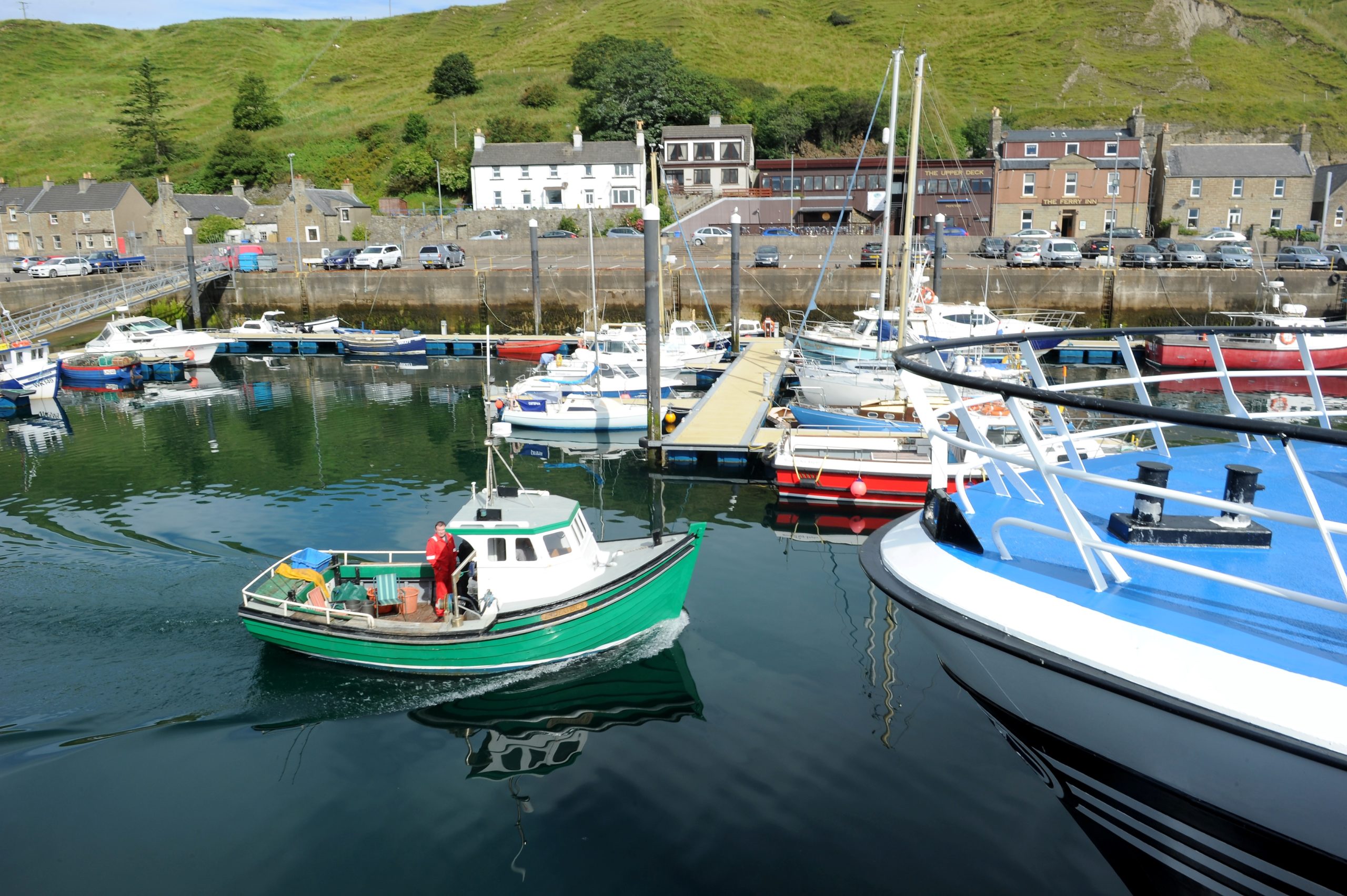 Small fishing vessels and pleasure craft in Scrabster harbour. Picture by Sandy McCook