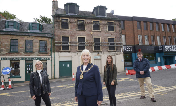 Gail Matheson, HHA chief executive, Provost of Inverness Helen Carmichael, Claire Dolan of HHA and Thom Macleod, managing director of Compass outside the Castle St building