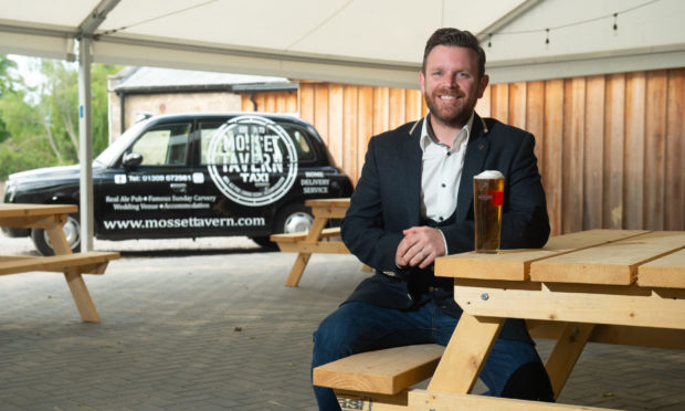 Proprietor Gordon Brailsford of the Mosset Tavern in Forres within the pub and beer garden. Picture by Jason Hedges