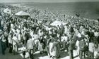 People enjoying a trip to Aberdeen Beach in the 1950s.