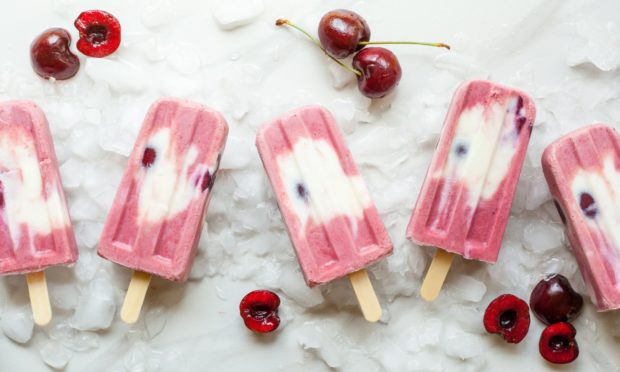 Strawberry yoghurt ice lollies.