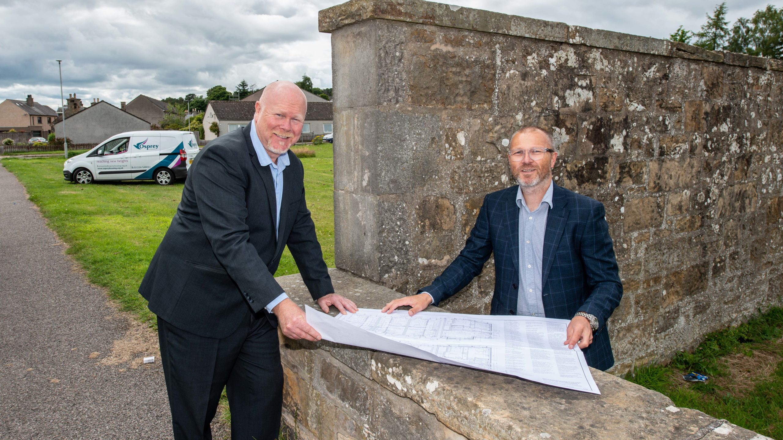 Allan Liddle (left), development officer at Osprey Housing Group and John Main (right), managing director of Morlich Homes.