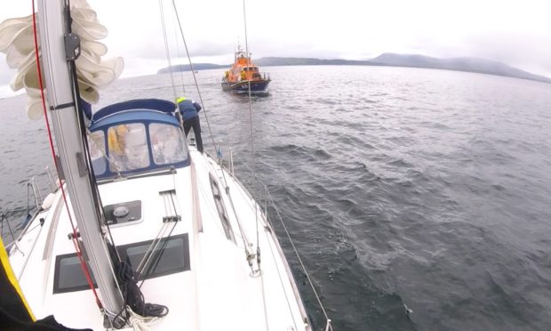 Oban lifeboat assisting a stranded yacht on the west coast.