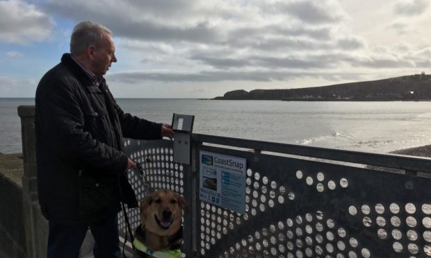 Mr Robertson and Murphy on Stonehaven's waterfront