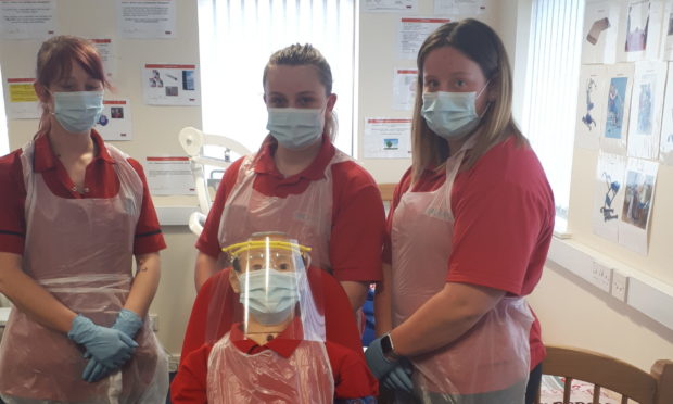 Mears recruits Melissa Burgess, Sophie Farrell and Kiah Flett with training dummy Jack.