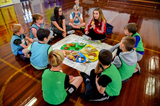 Pictured is volunteer Jenna McDonald during a Partner Schools project at Buchanhaven School in Peterhead.