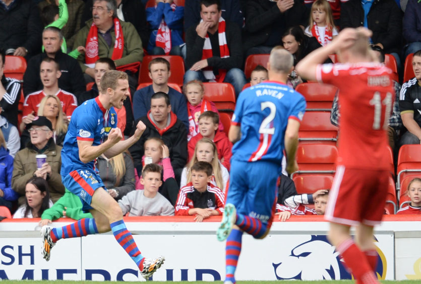 Marley Watkins celebrates after scoring against Aberdeen at Pittodrie in September 2014