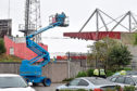 Aberdeen Fans on a cherry picker outside Pittodrie Stadium, Aberdeen as Aberdeen FC take on Rangers FC behind closed doors.
Picture by Darrell Benns.
