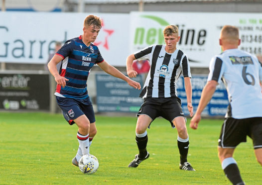 Joel MacBeath in action during his time with Ross County.