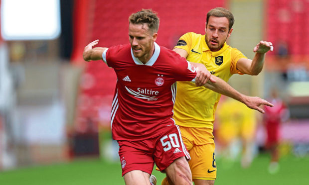 Marley Watkins in action for Aberdeen.