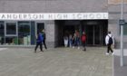 Pupils returning to Anderson High School in Lerwick.
