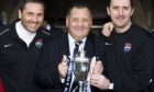 Ross County boss Jimmy Calderwood (centre) celebrates with son and assistant manager Scott (left) and coach Stuart Balmer after winning the Challenge Cup in 2011