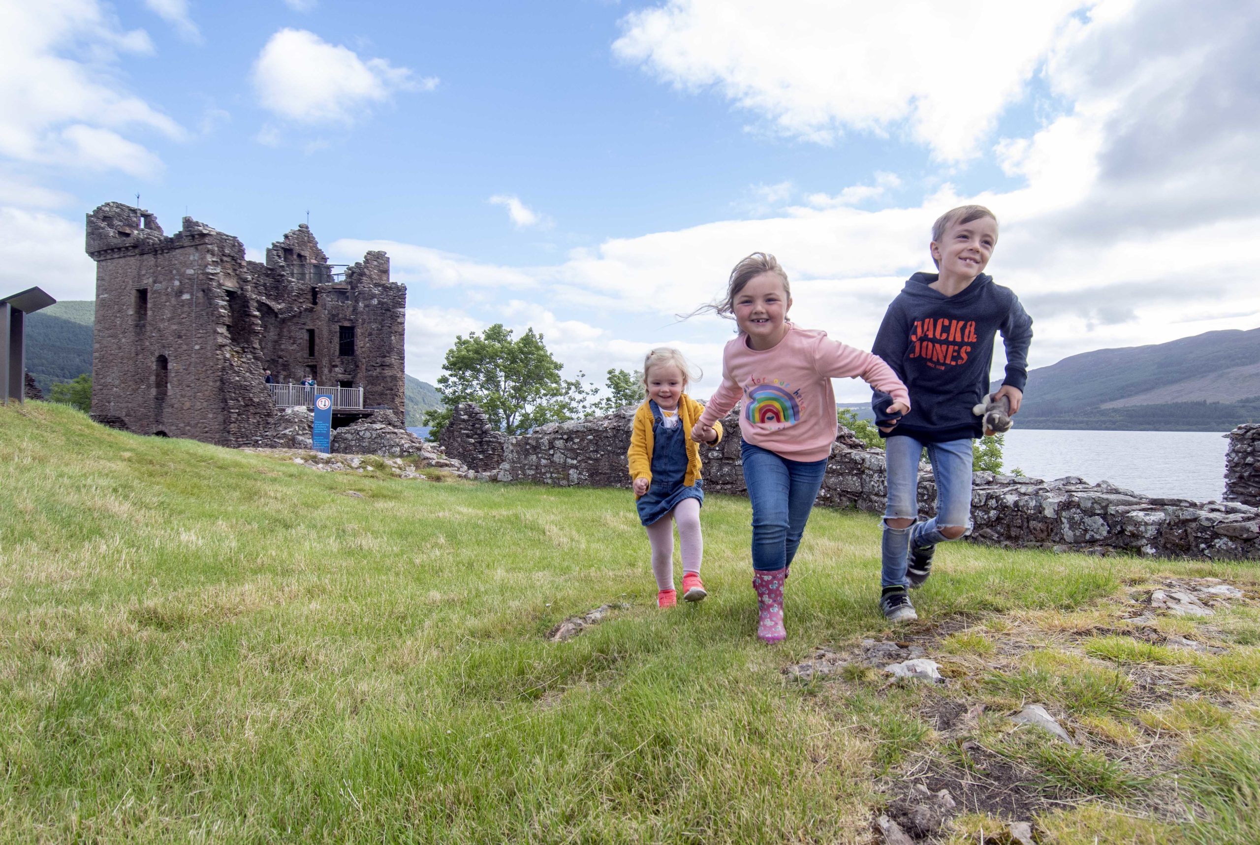 Ellie (3) and Archie (8) Robertson, from Edinburgh, with their cousin Sophia MacDonald, among the first to visit Urquhart Castle.