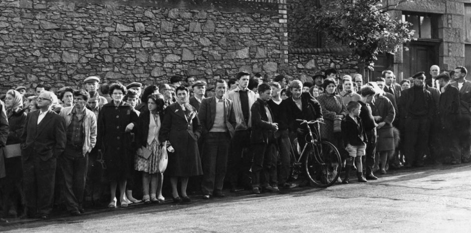 The crowd wait silently for the fateful moment outside Craiginches prison.