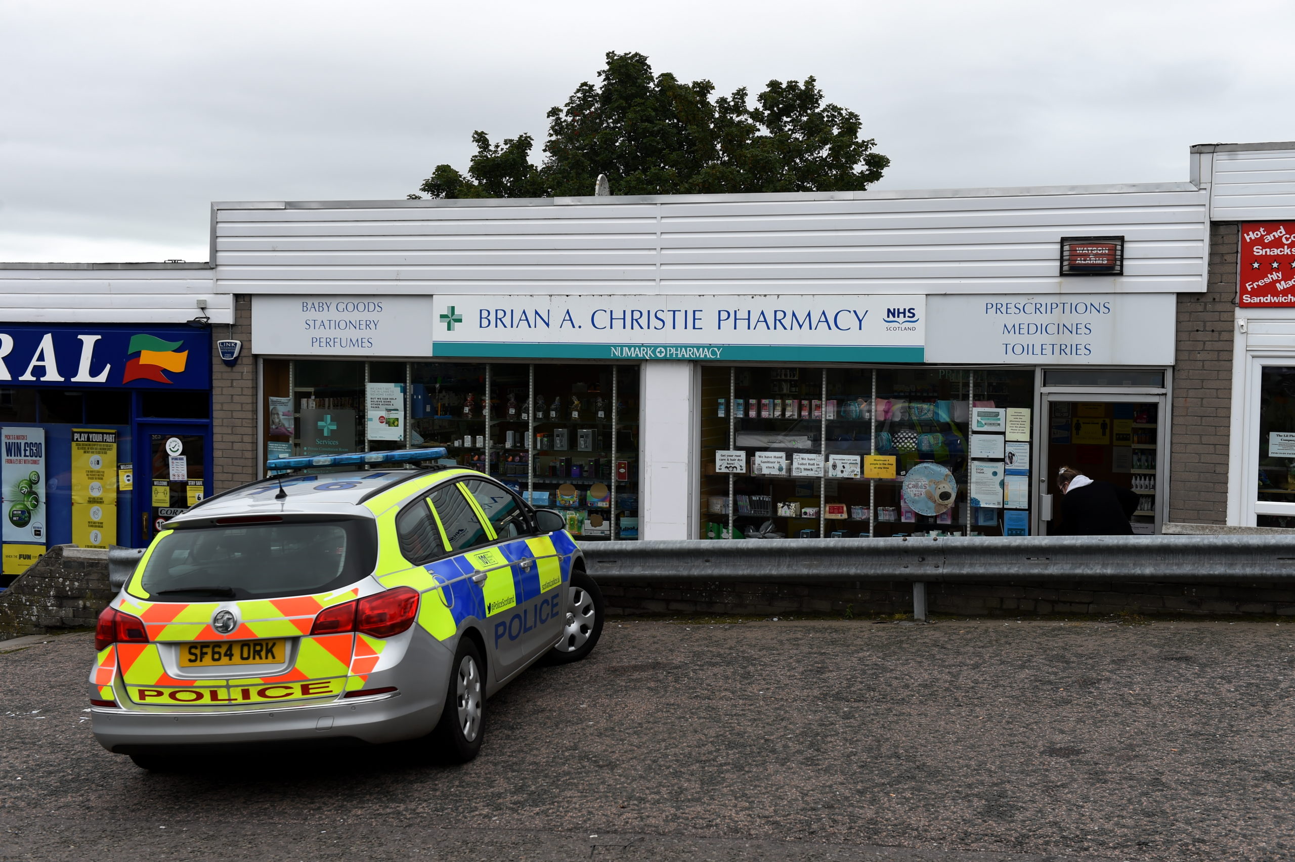 Police Scotland are at Brian A Christie Pharmacy, Sclattie Park, Bucksburn, Aberdeen.

Picture by Kenny Elrick     27/08/2020