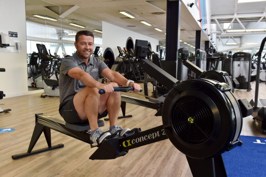 Chief executive of Aberdeen Sports Village, Duncan Sinclair, on the rowing machine. 
Picture by Kenny Elrick     28/08/2020