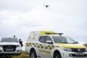 Police use a drone unit as search for a fallen climber continues.