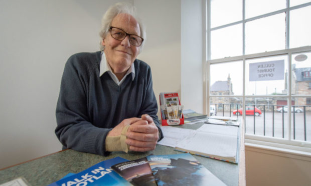 Graham Bell, secretary of Cullen Voluntary Tourist Initiative, inside the Tourist Information office in Cullen.