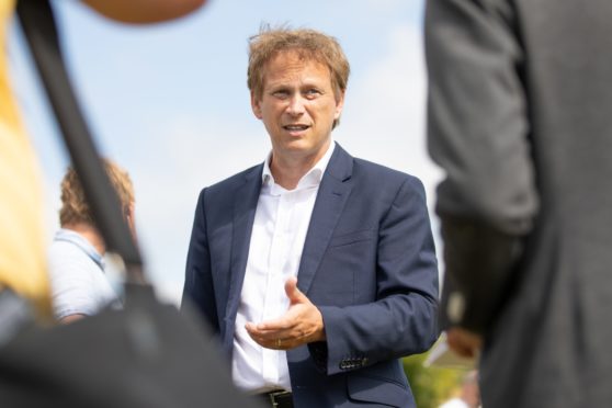 Grant Shapps, secretary of state for transport, talks to the press following his visit to the scene of the accident, near Stonehaven. Picture by Kim Cessford