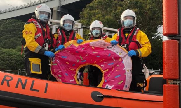 The RNLI crew at Kessock with the inflatable doughnut