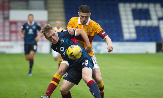 Josh Reid in action for Ross County.