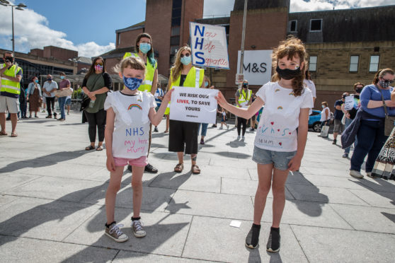 NHS workers protest for a fair pay increase in Falcon Square in Inverness.