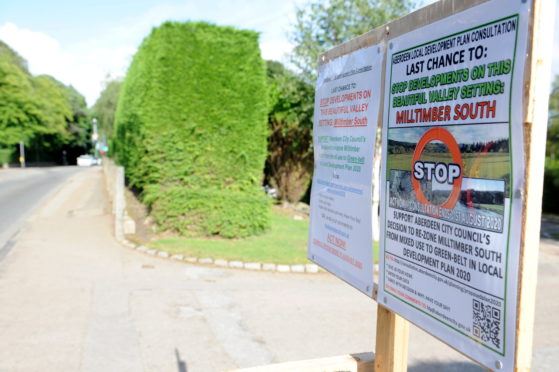 Pictured are the signs opposing the building on 100 new homes in Milltimber. This is the sign on North Deeside Road.
Picture by DARRELL BENNS  
Pictured on 20/08/2020
CR0023206