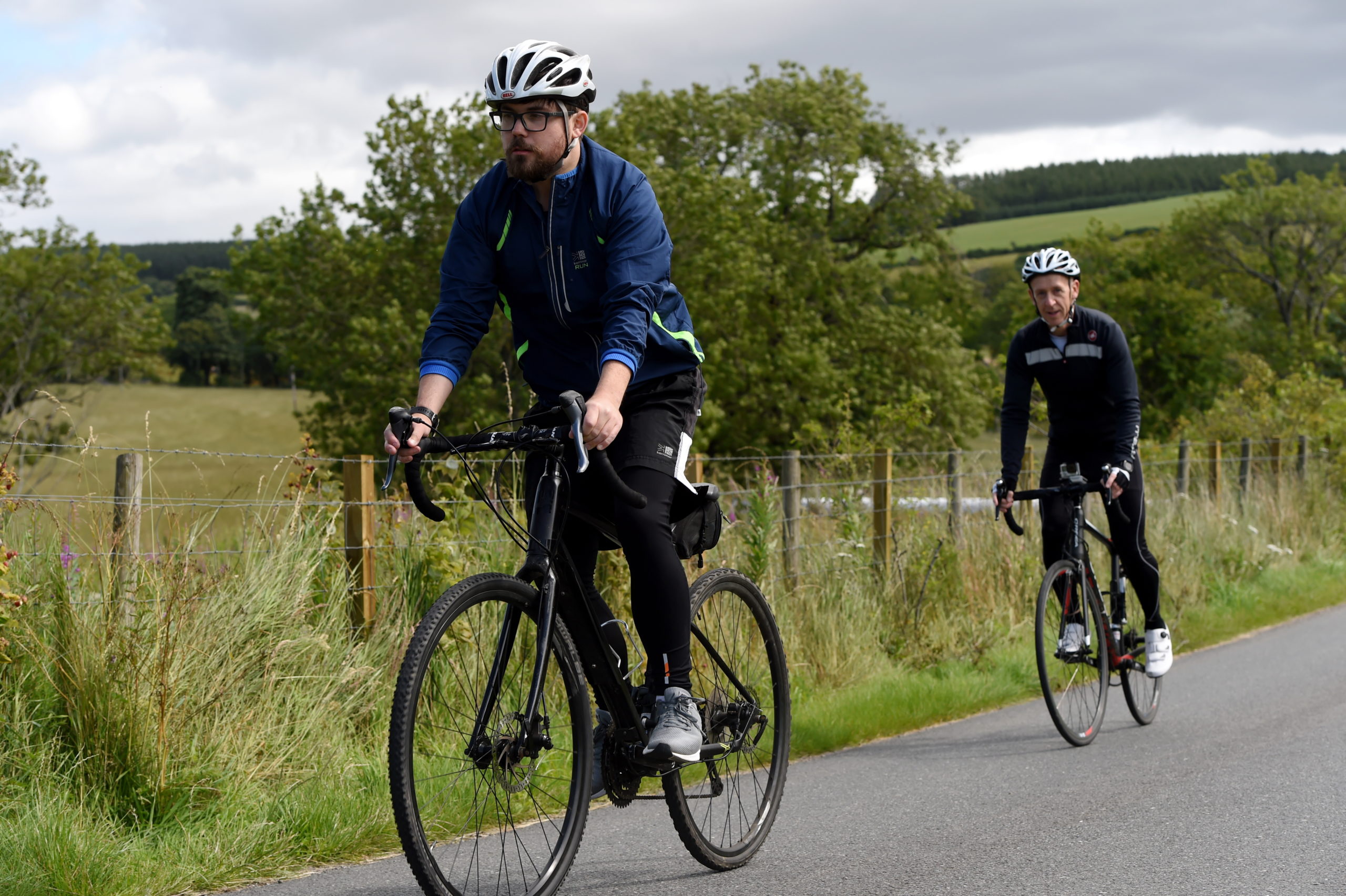 P&J reporter Jon Brady (front) on his first bike ride.