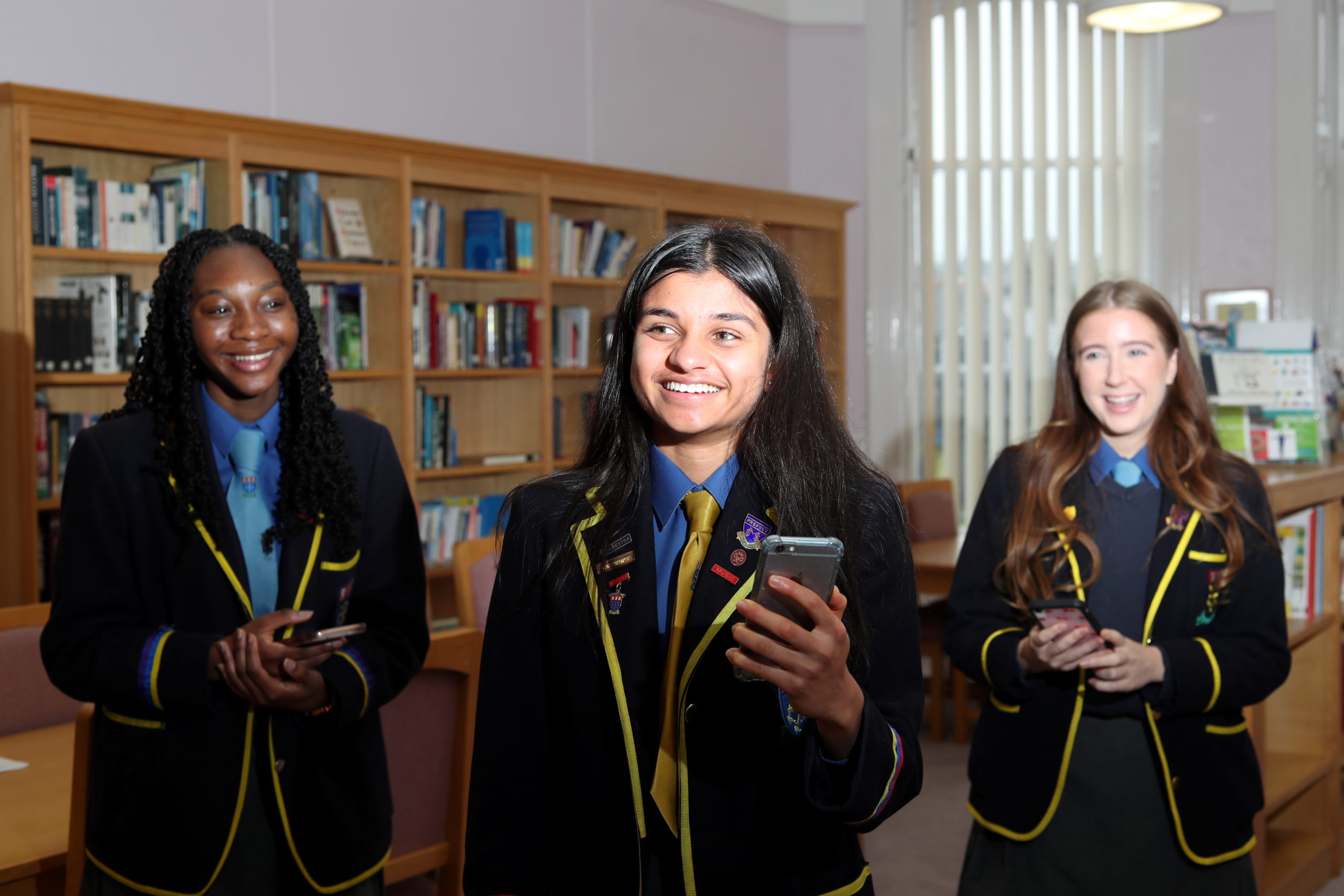St Margaret's School For Girls pupils (left to right) Oluwatofunmi Adenuga, Janani Mohan and Caitlin O'Byrne looking over their results in the school library.
Picture by Scott Baxter.