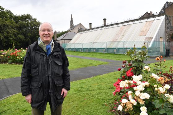 CLLR GLEN REYNOLDS AT THE VINERY AND GARDENS IN BANFF.