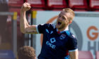 Coll Donaldson celebrates scoring for Ross County in the Premiership on Saturday.