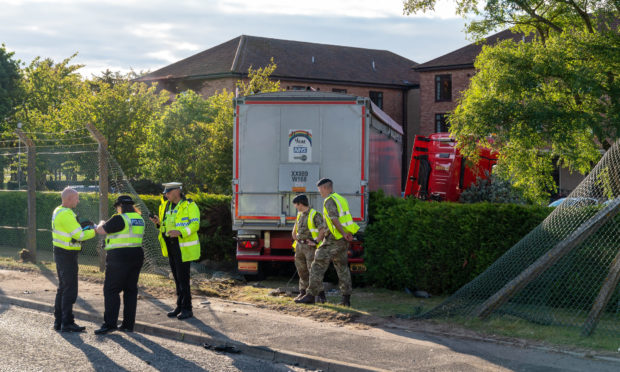 The lorry crashed through a fence at Kinloss Army Barracks