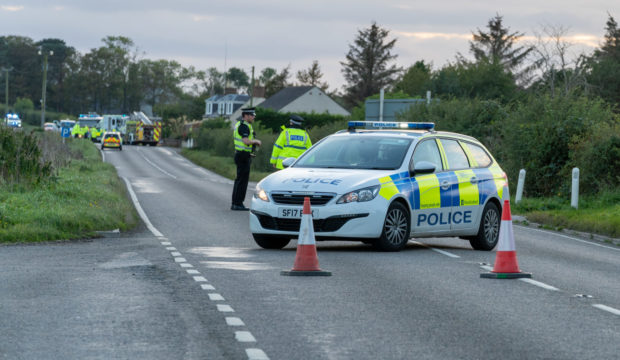 Police at the scene of the accident on October 4.