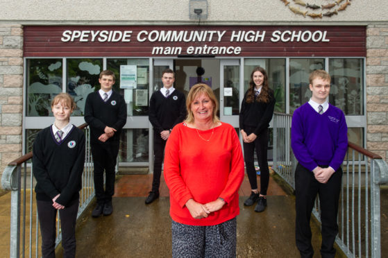 Isla Horsburgh, Euan Morrice, Jacob Currie, head teacher Tricia Goodbrand, Lauren Fotheringham and Sam Jackson celebrating exam success at Speyside High School.

Picture by Jason Hedges.