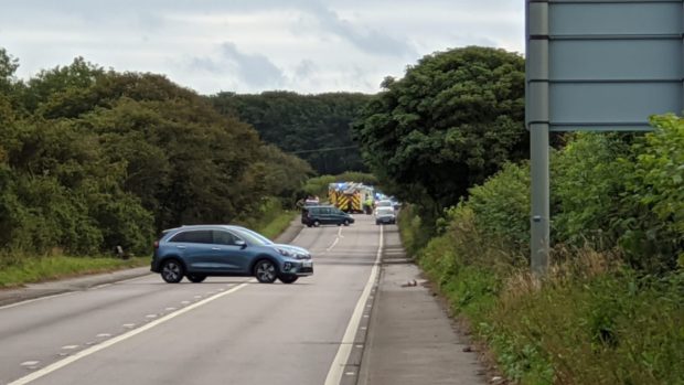 Emergency services at the scene of the crash on the A90