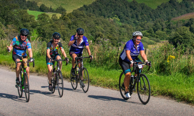 Participants in Ride the North in 2019 enjoy a fine day's cycling.