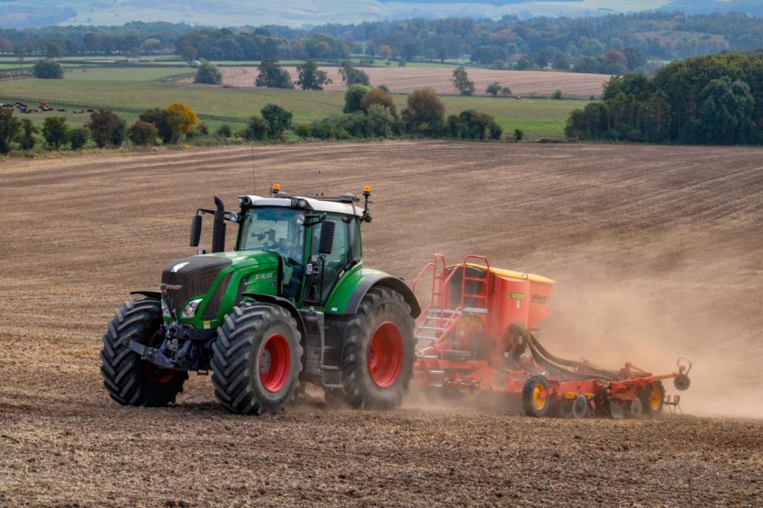 Tractor and seed drill