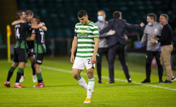 Celtic exited Champions League qualifying to Hungary's Ferencvaros.