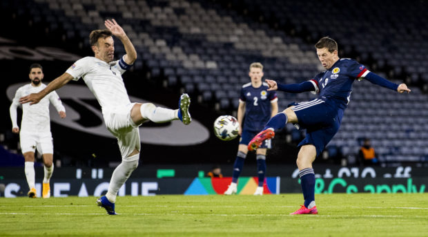 Israel's Bibras Natcho (L) and Callum McGregor of Scotland during the UEFA Nations League match last night.