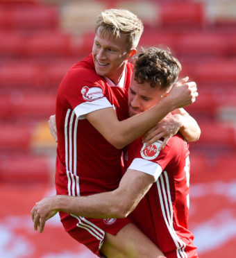 Aberdeen's Ross McCrorie (L) celebrates making it 1-0 with Marley Watkins