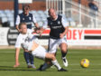 Harry Milne challenges Charlie Adam during Cove Rangers' pre-season friendly with Dundee.