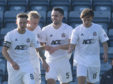 Cove Rangers players celebrate Scott Ross' opening goal against Dundee.