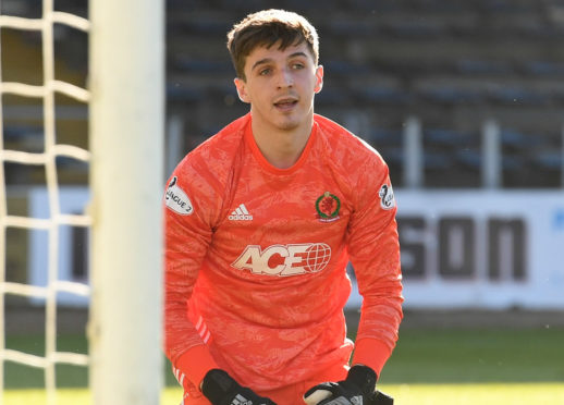 Ryan Mullen made his debut in goal against Dundee.