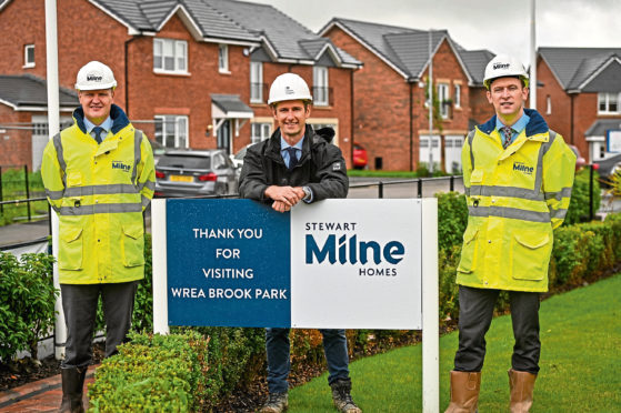 L-R: Paul Challinor MD Stewart Milne Homes North West, Terry Errington head of structured real estate finance, Homes England and Neil Washington, finance director Stewart Milne Homes North West at Wrea Brook Park