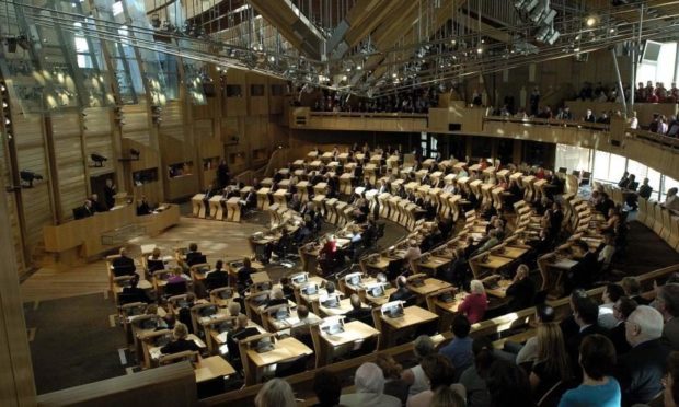 The Holyrood Chamber in the pre-Covid era.