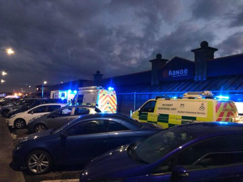 Ambulances attend the scene at Aberdeen Beach. Picture by Ben Hendry