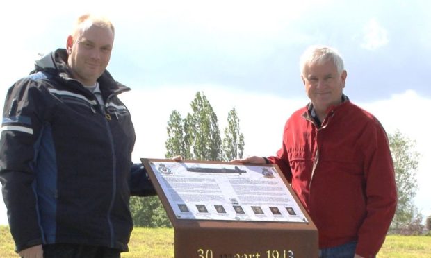 Chris van der Linden and Bob van Wyk at the memorial for the crew of ED761 near Waverveen, The Netherlands.