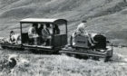 The Dalmunzie railway complete with passengers and a dog in April 1977.