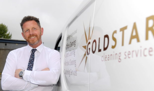 Scott Willox outside Goldstar Cleaning Services.